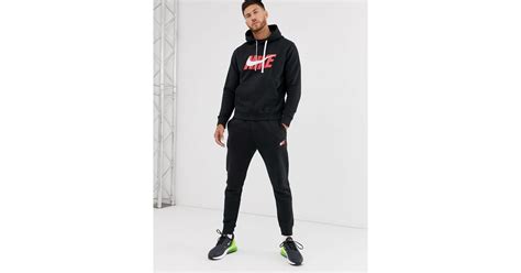 nike schwarzer trainingsanzug mit swoosh logo|trainingsanzüge herren.